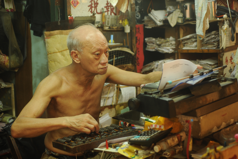 當年文明里的寫信先生，仍可在玉器市場中找到他們。